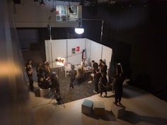 A sleek studio setup with cameras and lighting ready for a shoot.