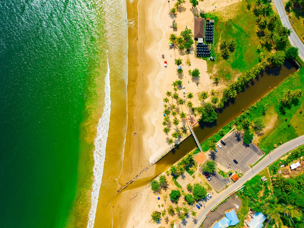 an aerial view of a beach and a body of water