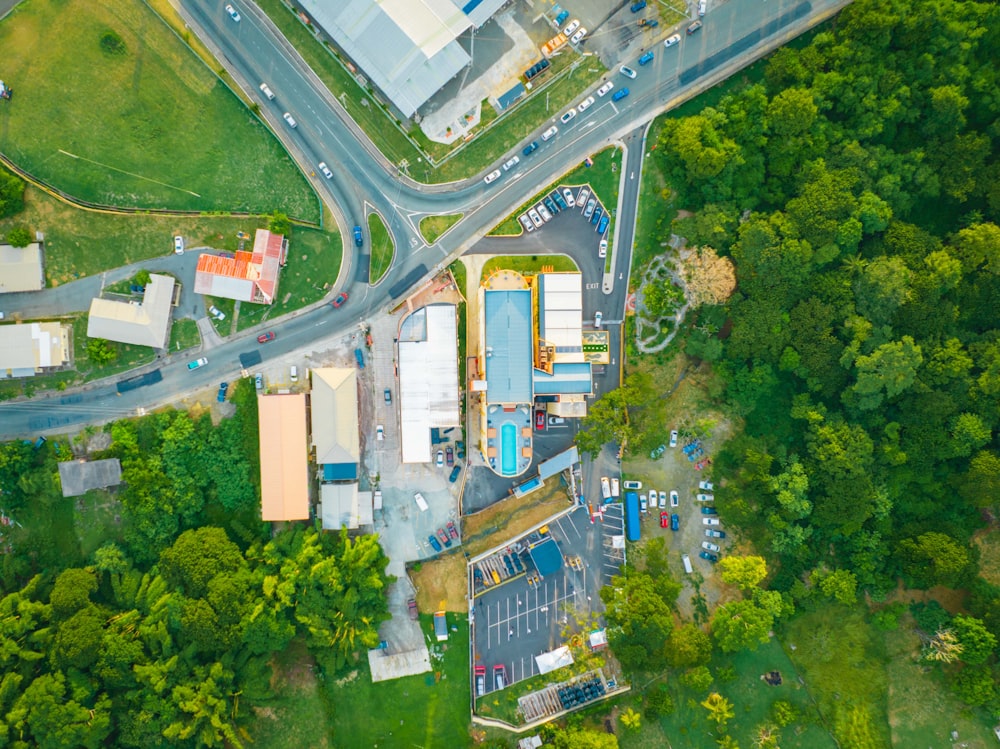 an aerial view of a road and a parking lot