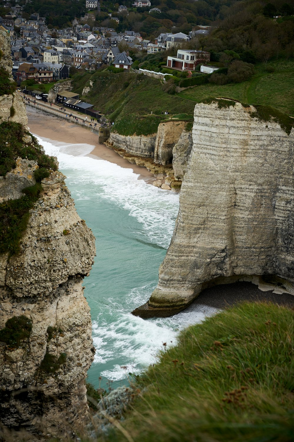 a view of a beach from a cliff