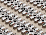 a room filled with lots of desks and computers