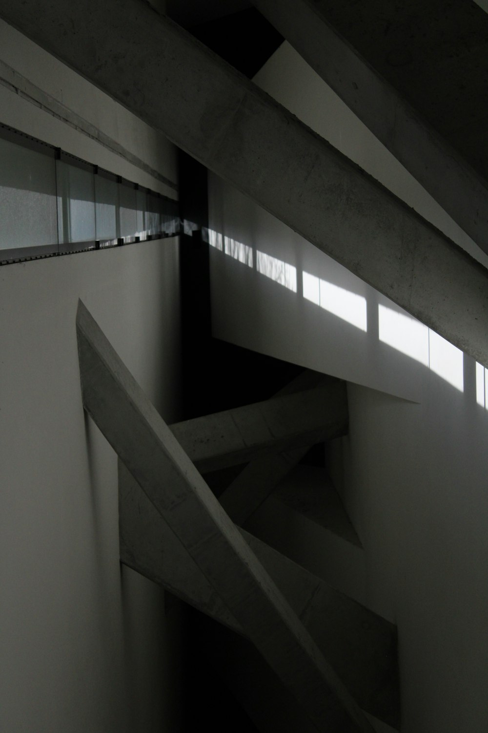 a black and white photo of a staircase