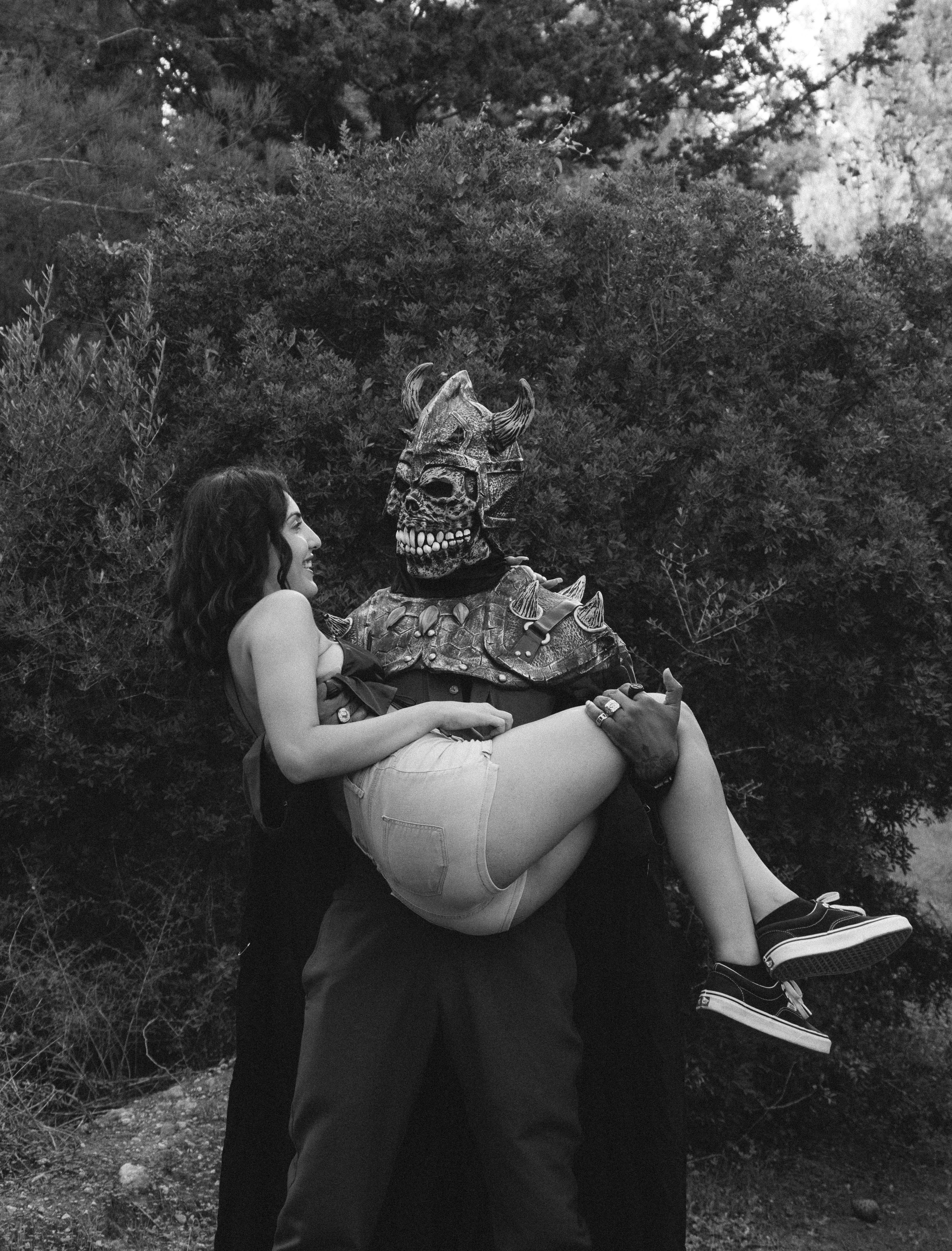 a man and a woman dressed up in costumes