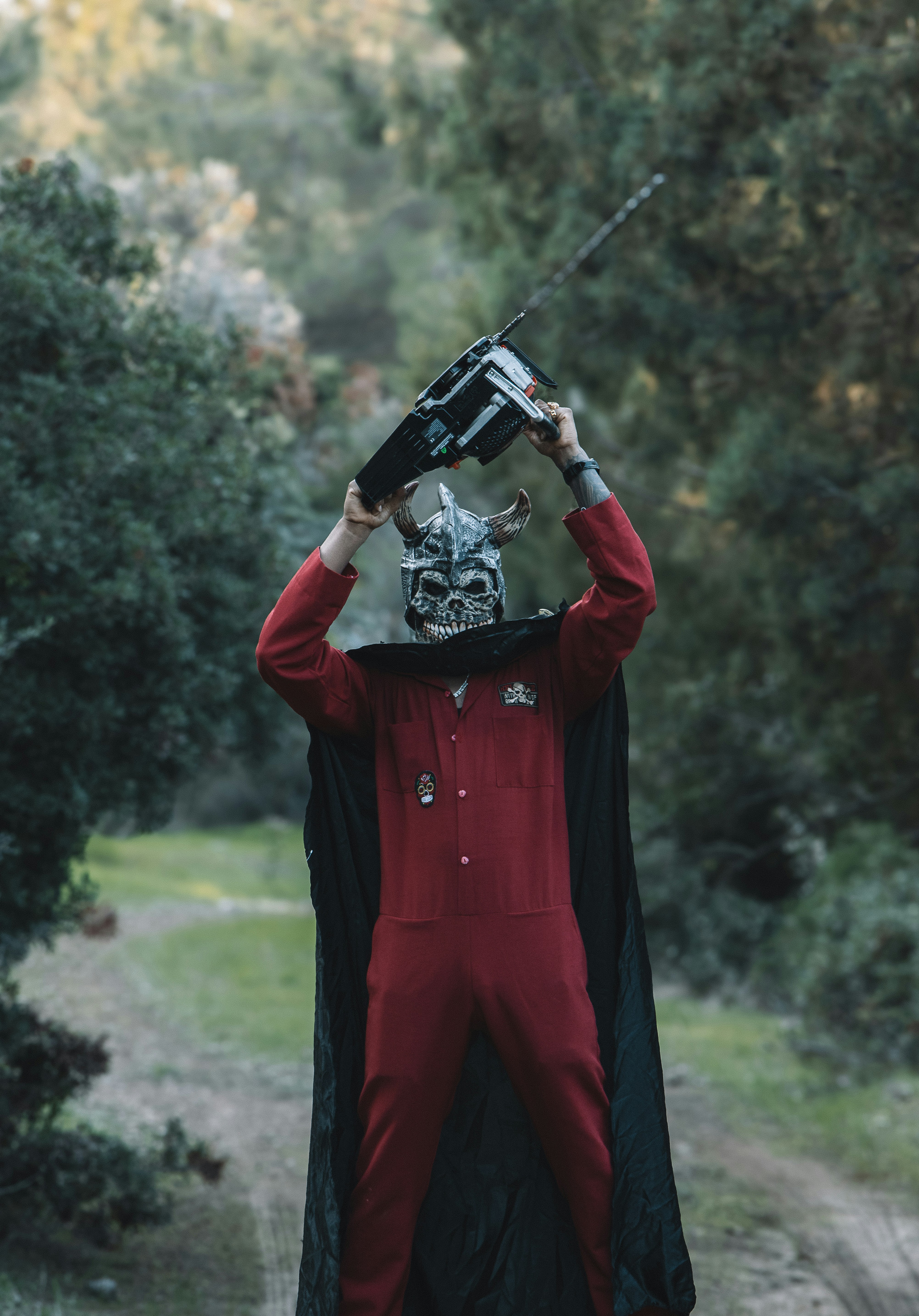 a person in a costume holding a camera up to their face