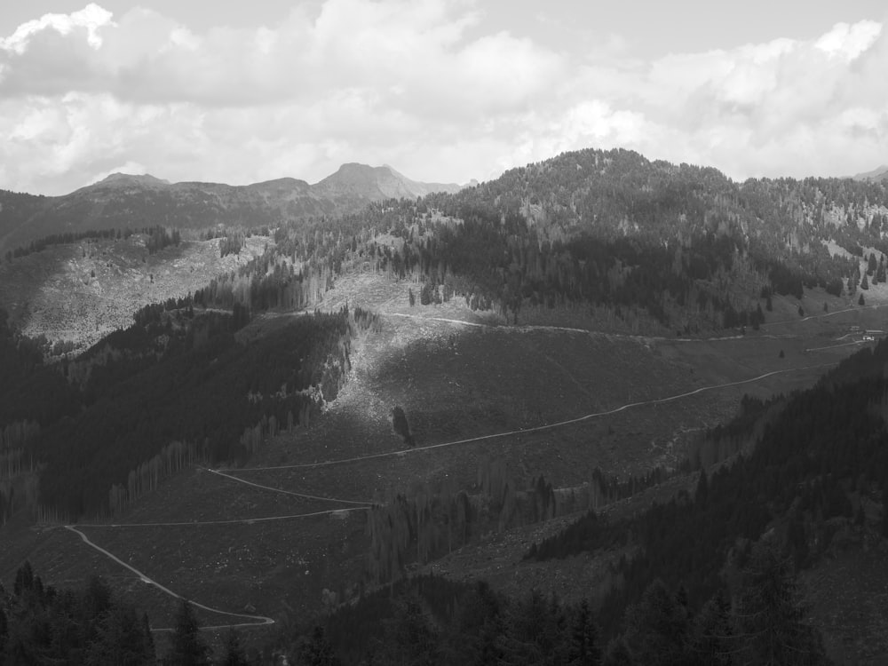 a black and white photo of a mountain range