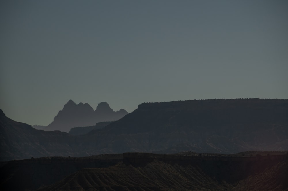 a view of a mountain range from a distance