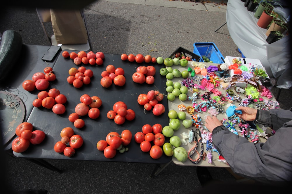 a table topped with lots of different types of fruit