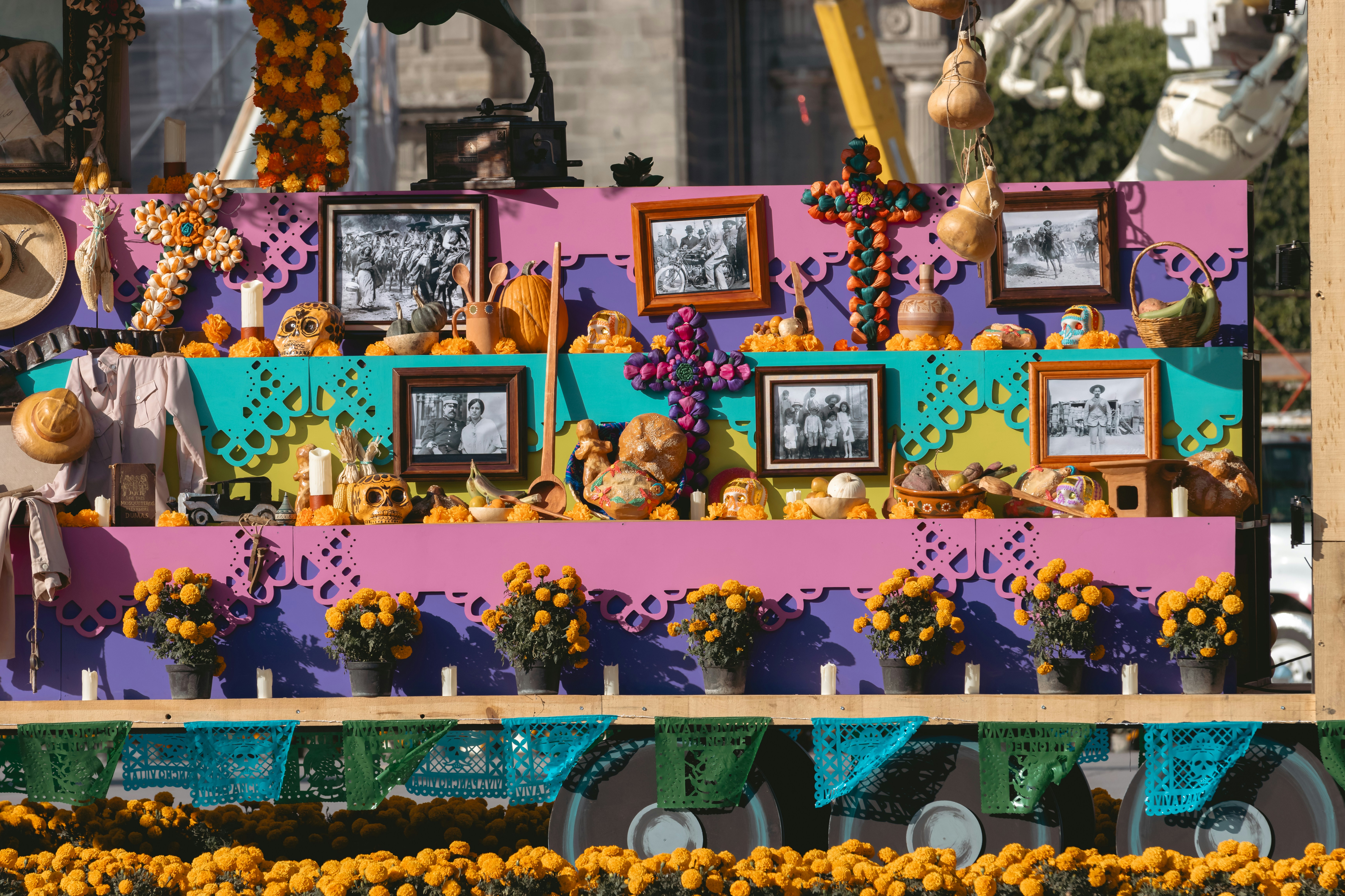 a colorful display with pictures and flowers on it