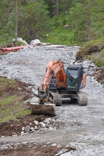 a couple of machines that are sitting in the dirt