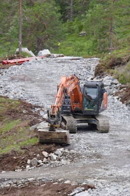 a couple of machines that are sitting in the dirt