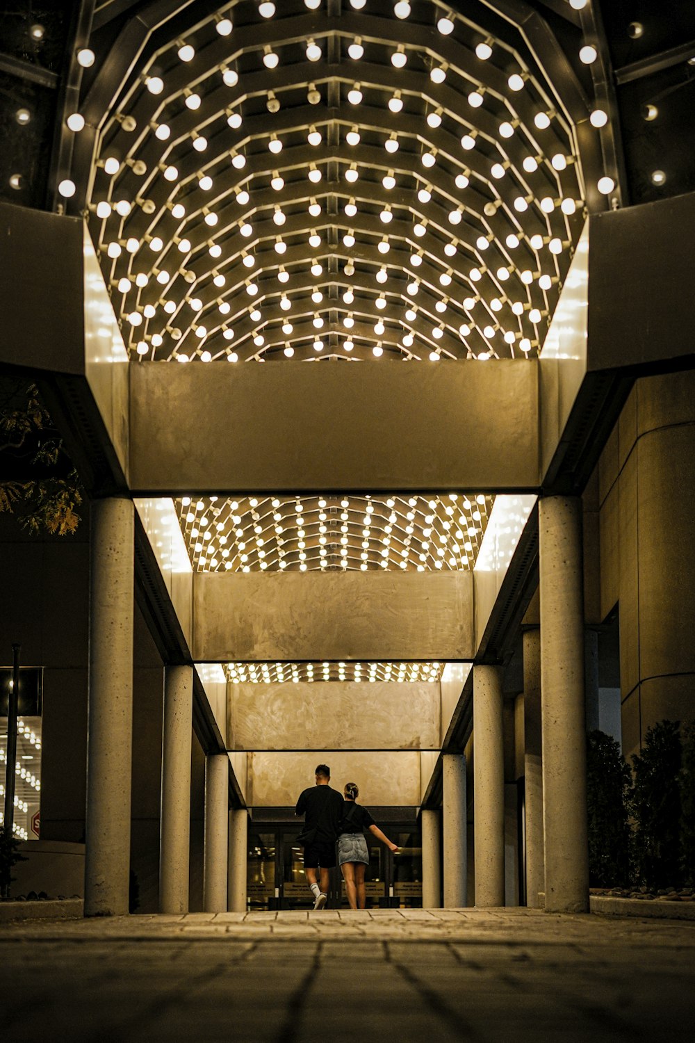 a man is standing in the doorway of a building