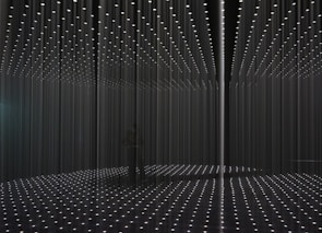 An immersive site-responsive installation featuring layered materials and soft lighting.