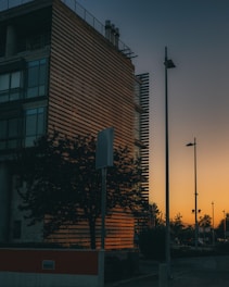 Modern residential building exterior in Sorocaba at sunset.