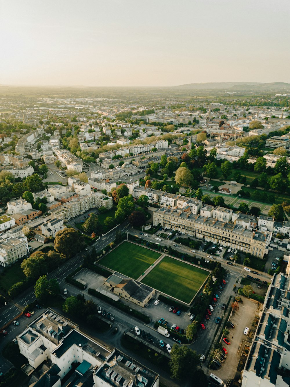 an aerial view of a soccer field in a city