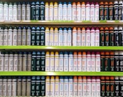 Image of personal care items like lotions, shampoos, and soaps arranged neatly
