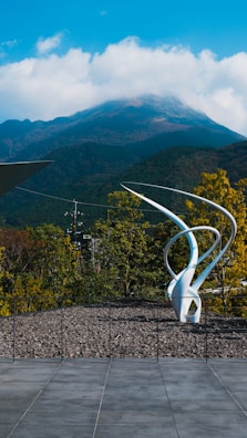 A large sculpture displayed in an elegant outdoor space.