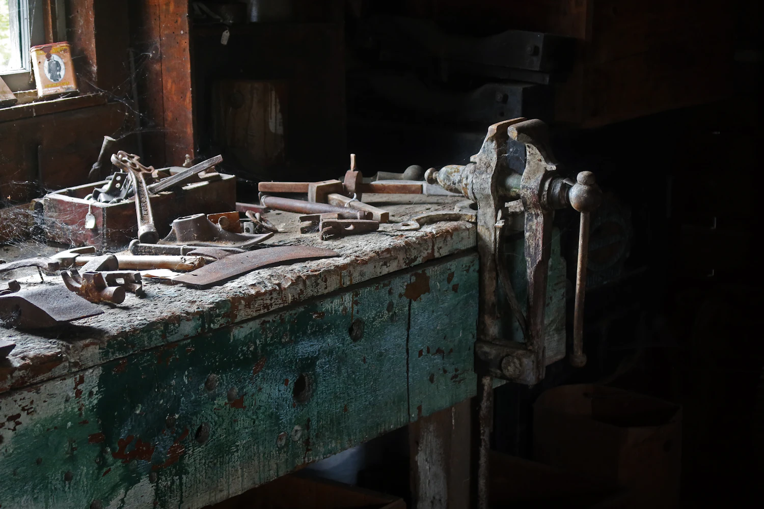Woodworking tools arranged on a real workshop workbench