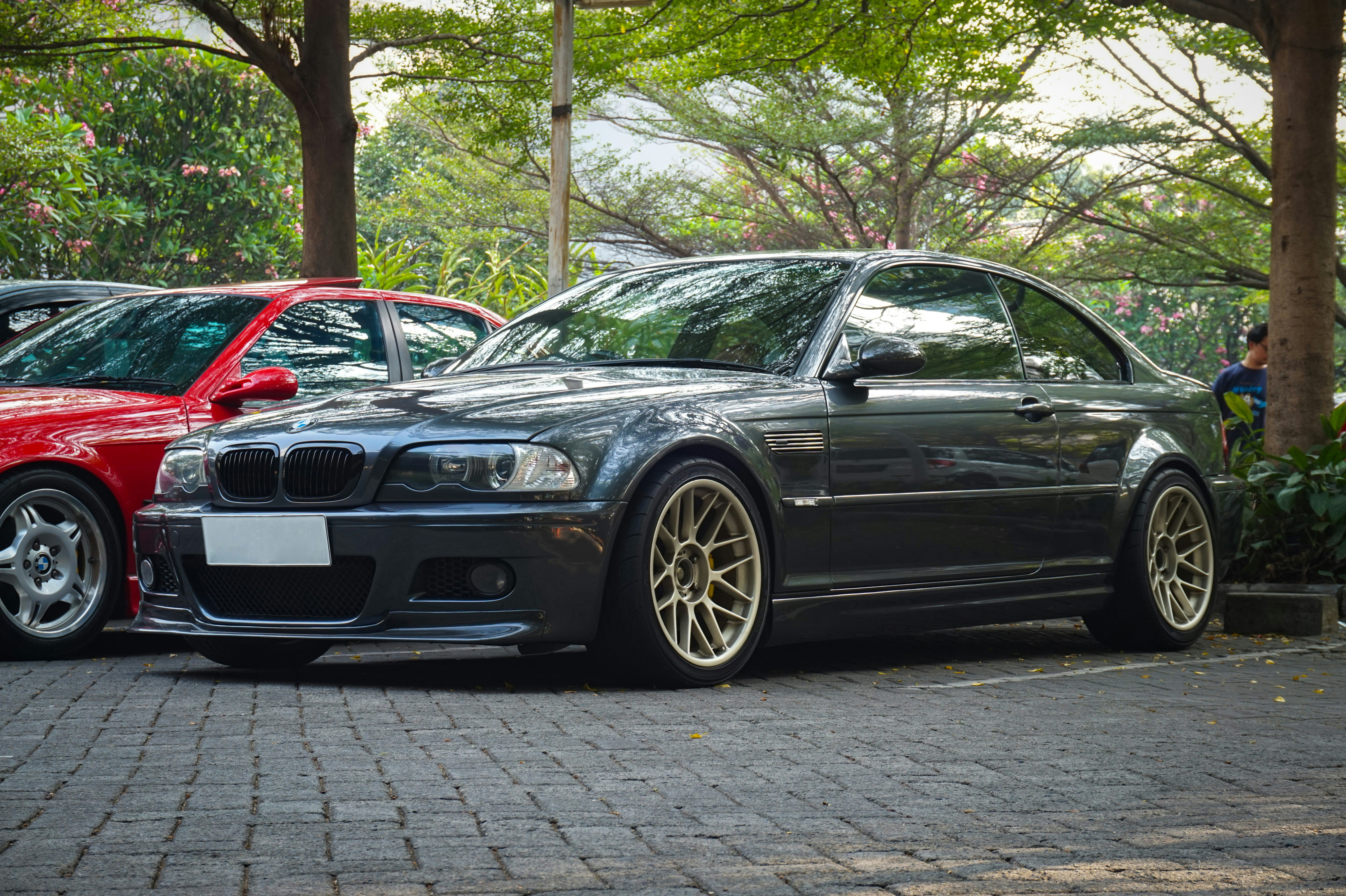 a couple of cars parked next to each other