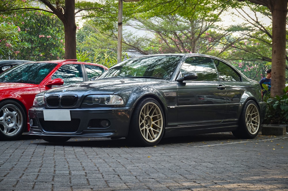 a couple of cars parked next to each other