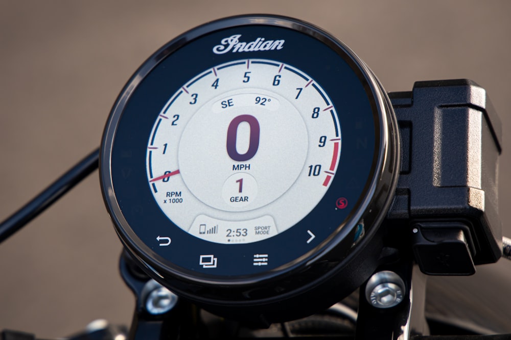 a close up of a speedometer on a motorcycle