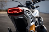 Rear view of the ionoki motorcycle showing the tail light and exhaust design.