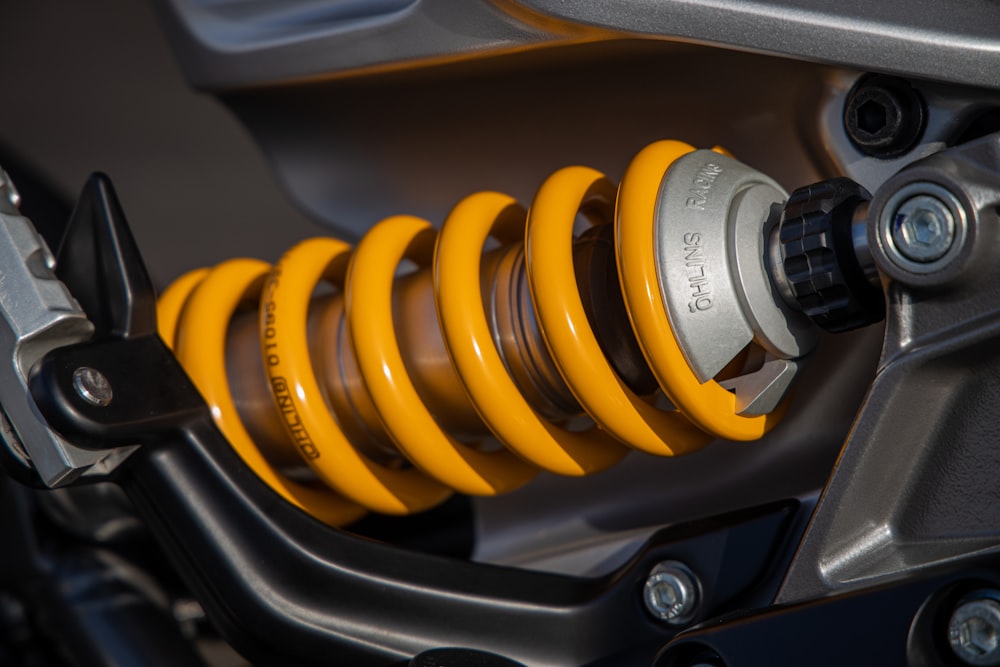 a close up of a motorcycle front suspension