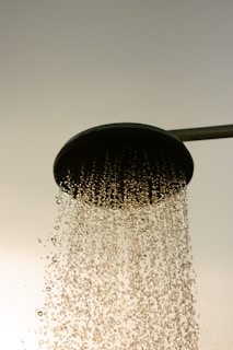 a shower head with a lot of water coming out of it