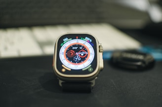a close up of a smart watch on a table