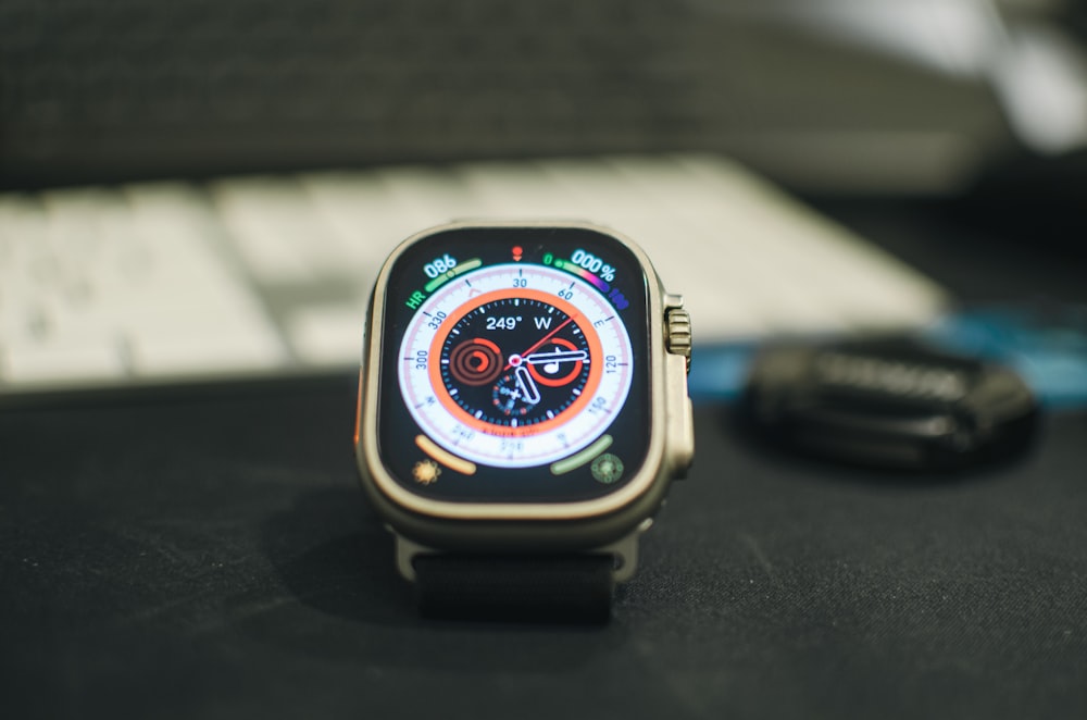 a close up of a smart watch on a table