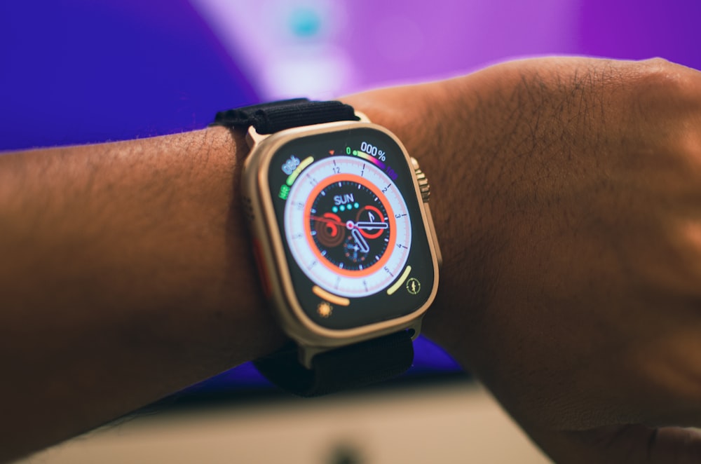 a close up of a person's wrist with a watch on it