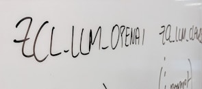 Close-up of a whiteboard filled with AI concepts and diagrams during a course.