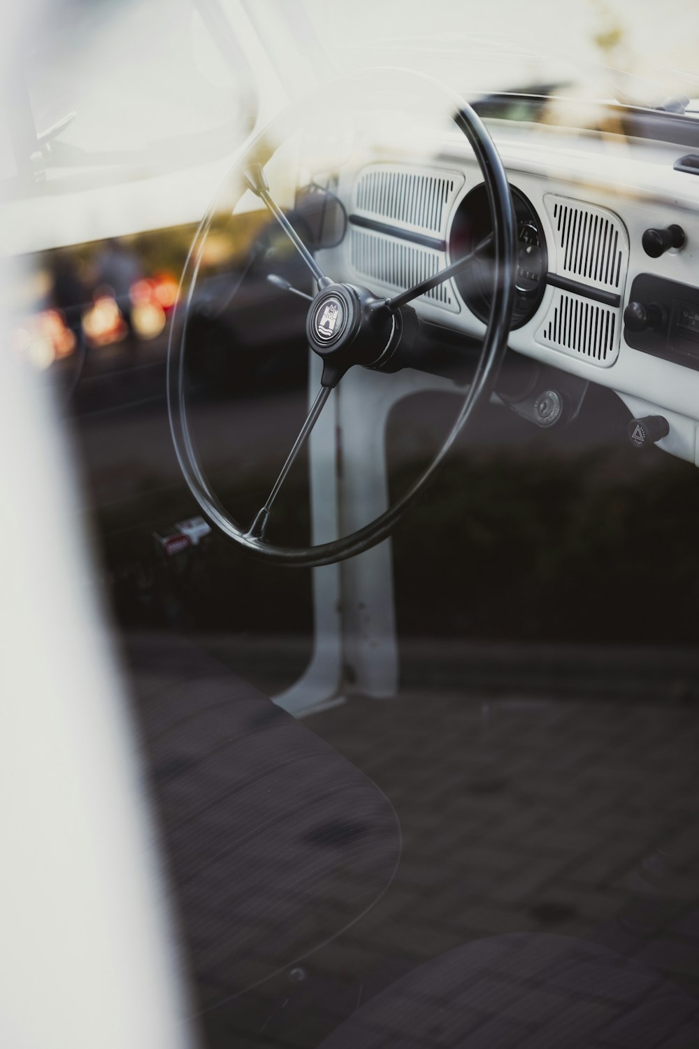 a car dashboard with a steering wheel and a dash board