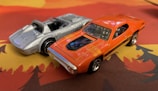 Jada Toys die-cast cars lined up with shiny finishes.