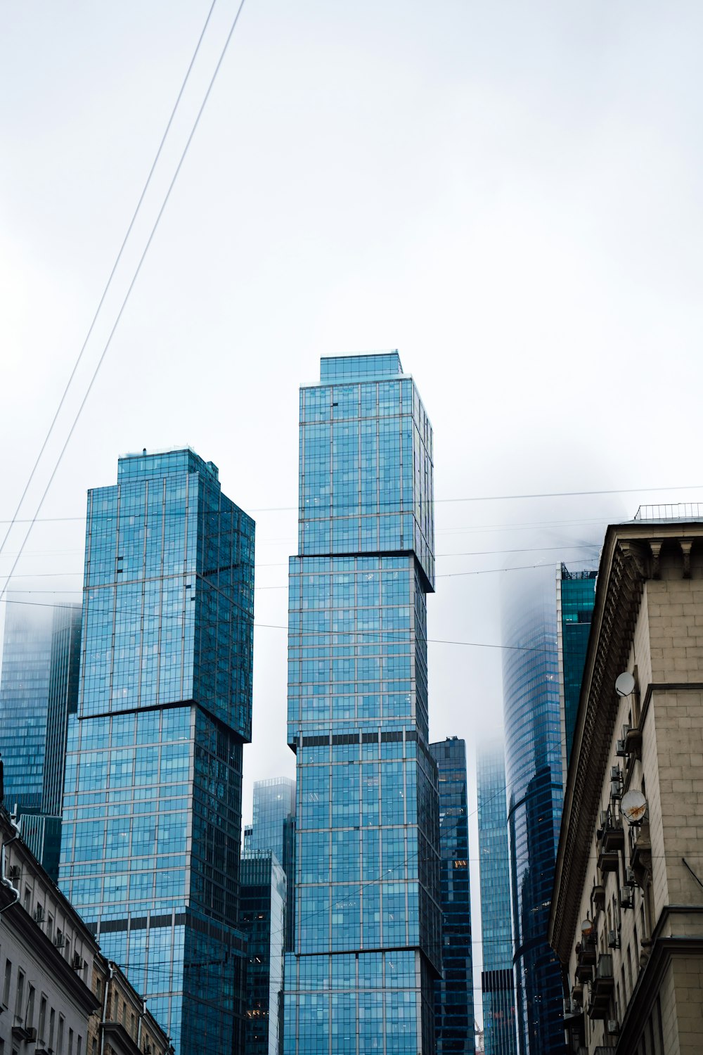 a group of tall buildings sitting next to each other