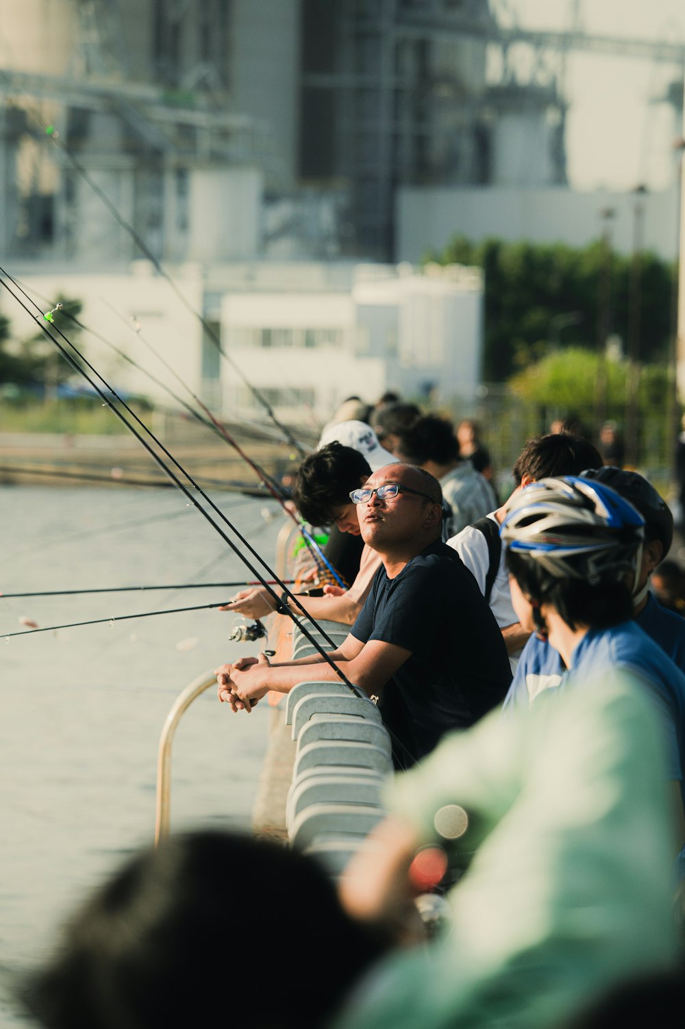 a group of people fishing on a river