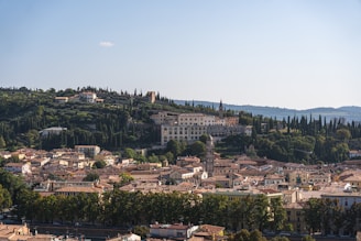 Panoramic view of Florence hills dotted with cypress trees and rustic estates.