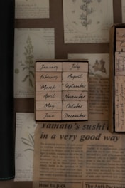 Historic calendar pages with QR codes and vintage maps