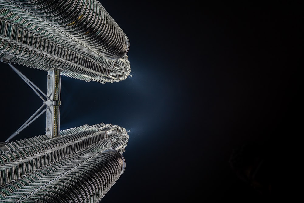 a very tall building with a sky background