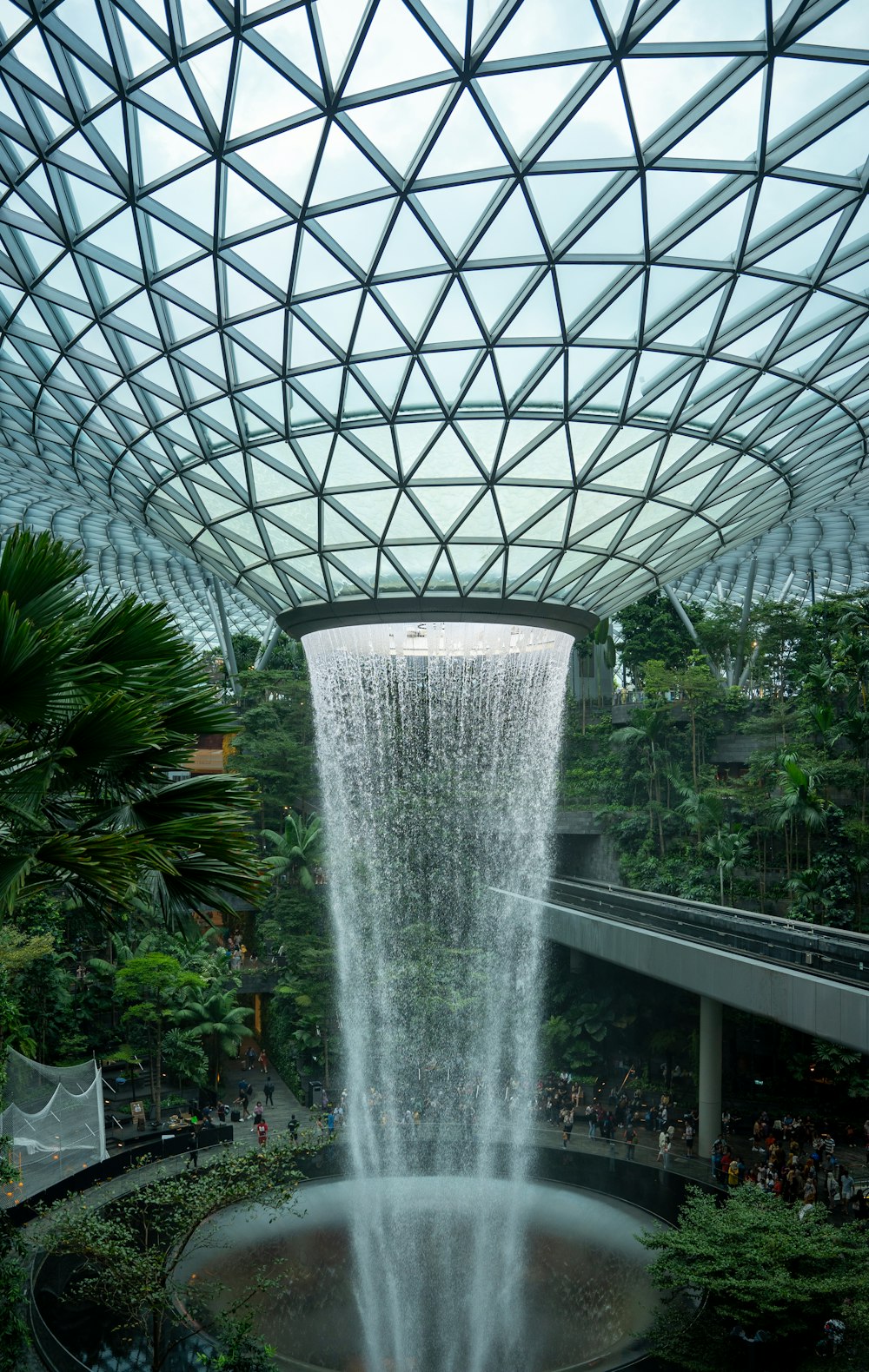 a large waterfall in the middle of a building