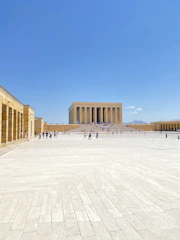 Wide shot of a courtyard with clean, bright paving stones after elpako treatment