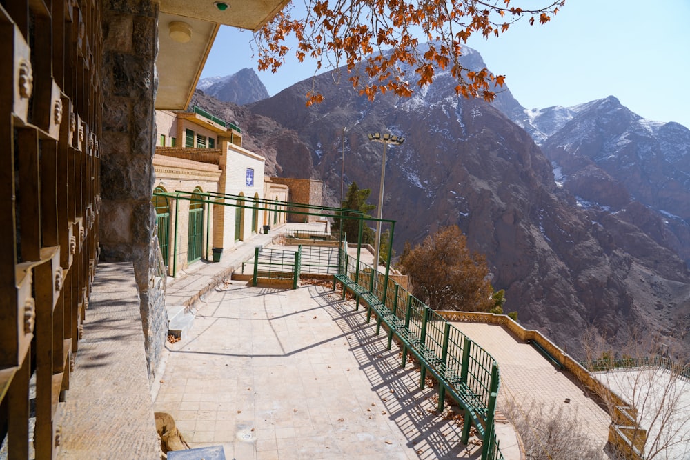 a view of a building with a mountain in the background