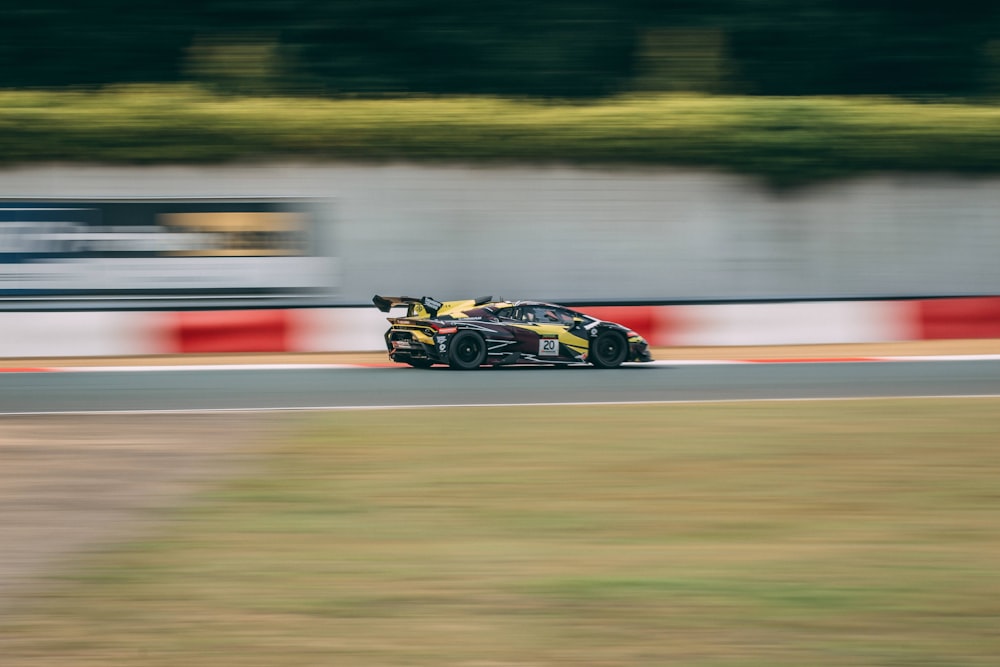 a racing car driving down a race track