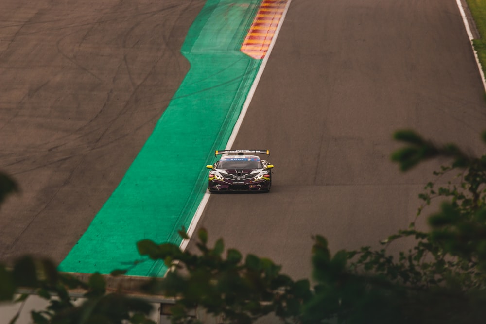 a race car driving down a race track