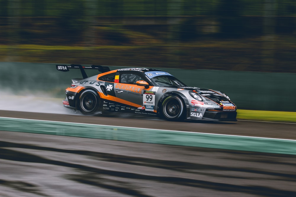 a car driving on a race track during the day