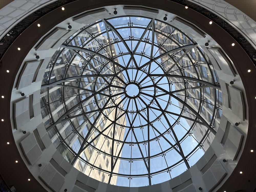 a circular glass ceiling in a building