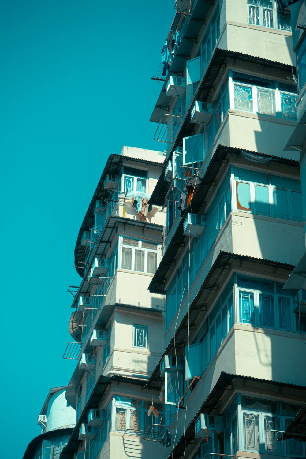 a tall building with balconies and balconies on the balconies