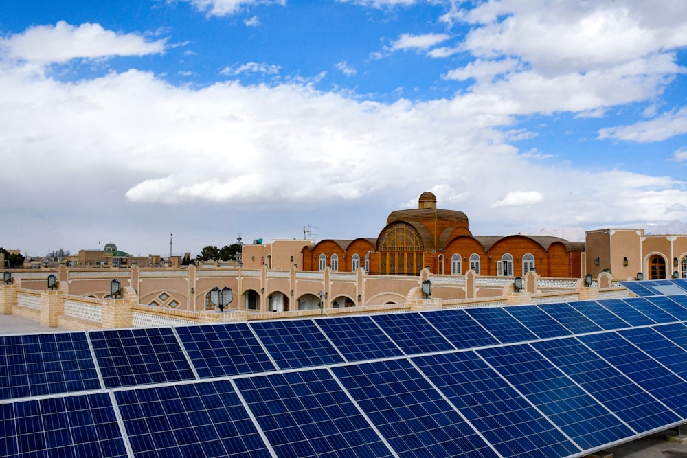 a building with a lot of solar panels on the roof