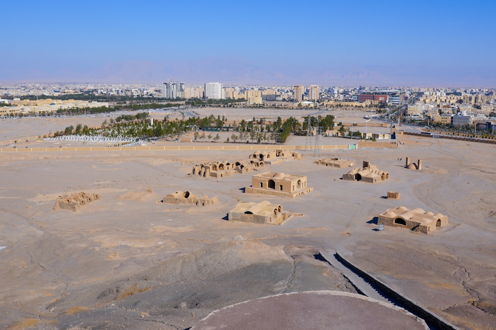 an aerial view of a desert town in the middle of the desert