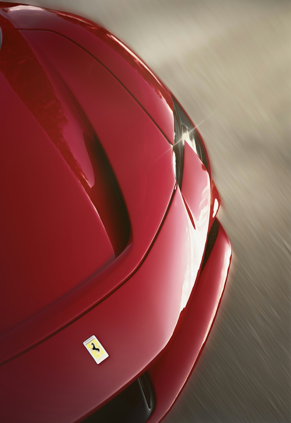 a close up of a red sports car