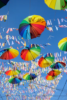 Close-up of handcrafted umbul-umbul fluttering on a bright sunny day in a neighborhood celebration.
